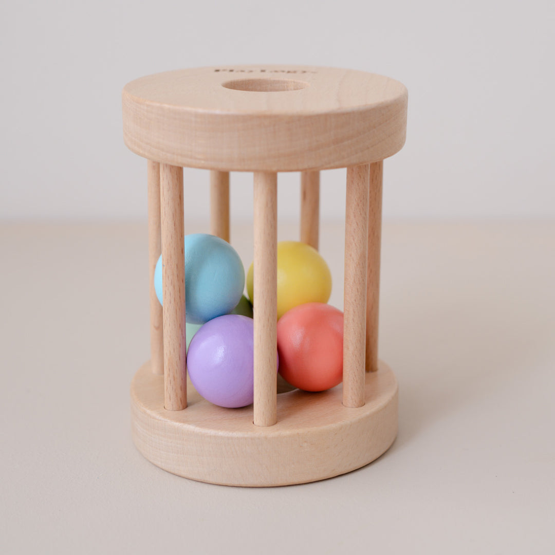Wooden Rolling Rattle toy for babies.