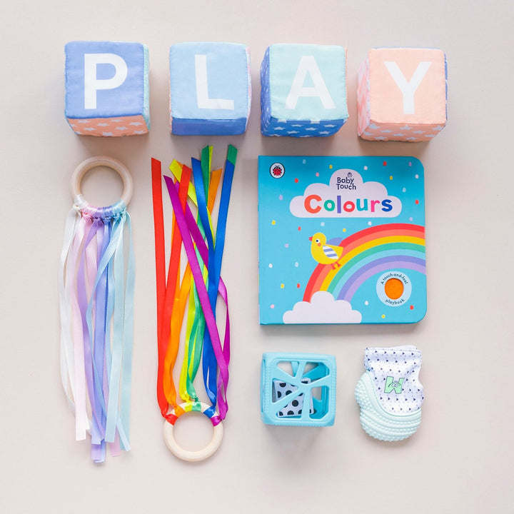 Assorted Laugh & Learn PlayBox toys for babies 5–6-month-olds educational development.